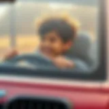 A child enjoying the thrill of driving a BMW electric car