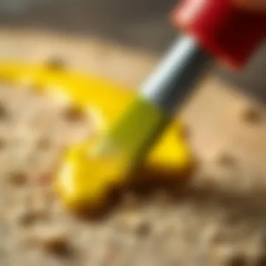 A close-up of plastic paint applied on a textured surface